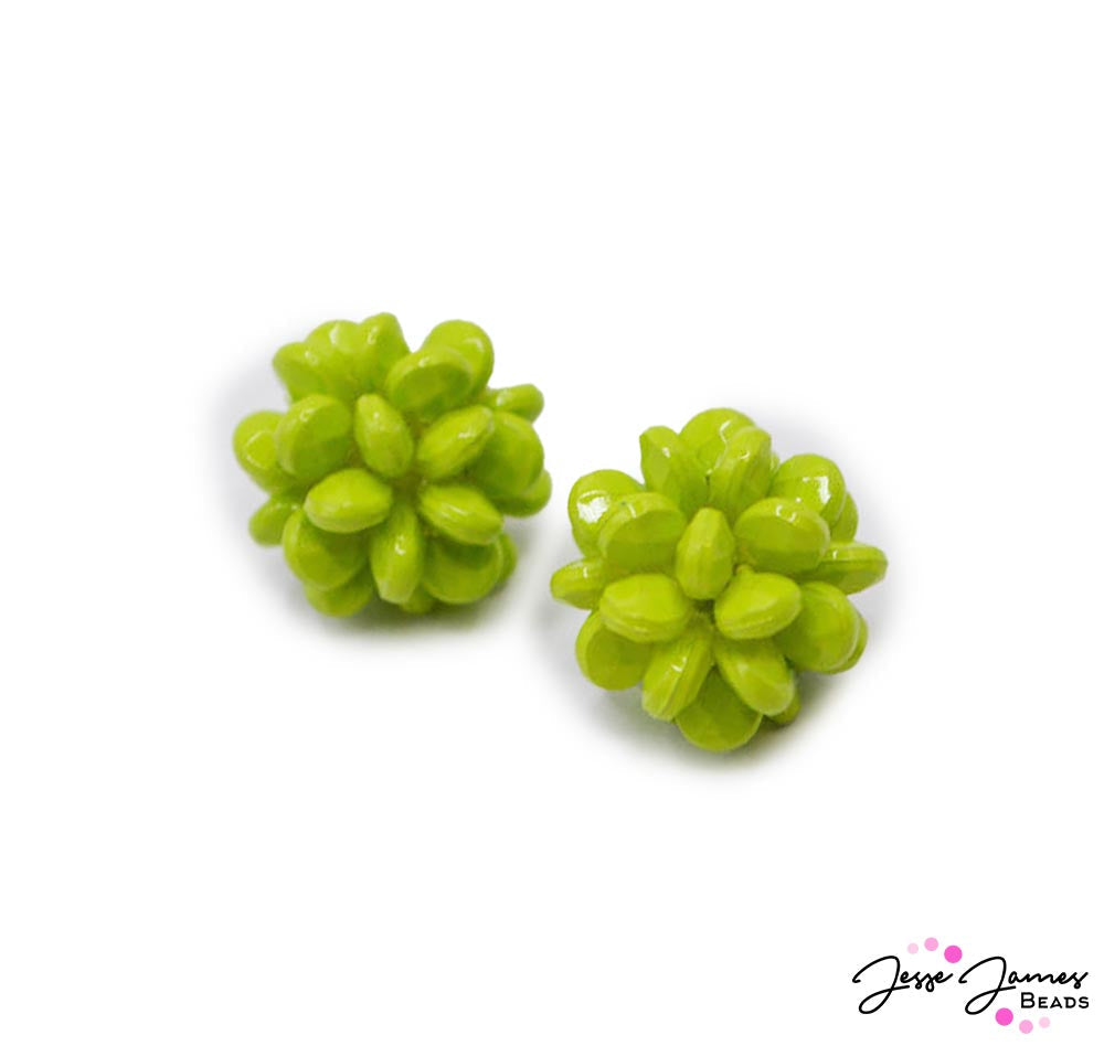 These bright green beads capture the refreshing and serene ambiance of a 1950s pool party, surrounded by lush greenery and clear waters. 18mm. 2 beads per order.