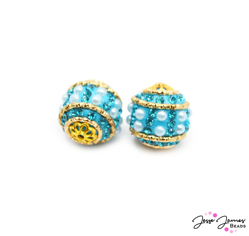 Sparkling embedded glass evokes visions of sugar-spun confections, adding a sweet and whimsical flair to any project they adorn. These delicately handcrafted beads are designed to infuse your creations with a touch of bohemian charm and timeless sophistication. 2 Beads per set. Boho measures 18mm.