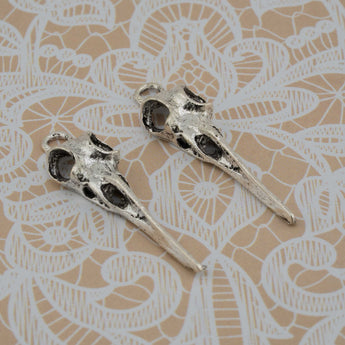 Curiosity Cabinet Bird Skull Charm Duo