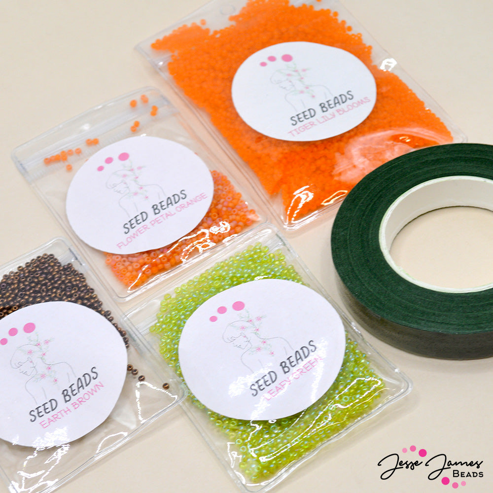 Create your own beady bouquet with Meredith Roddy's Tiger Lily French Wire Flower kit. Each kit includes a spool of floral tape, Seed beads in Tiger Lily Blooms, Flower Petal Orange, Earth Brown, and Leafy Green. Not included in kit is 24 Gauge wire.