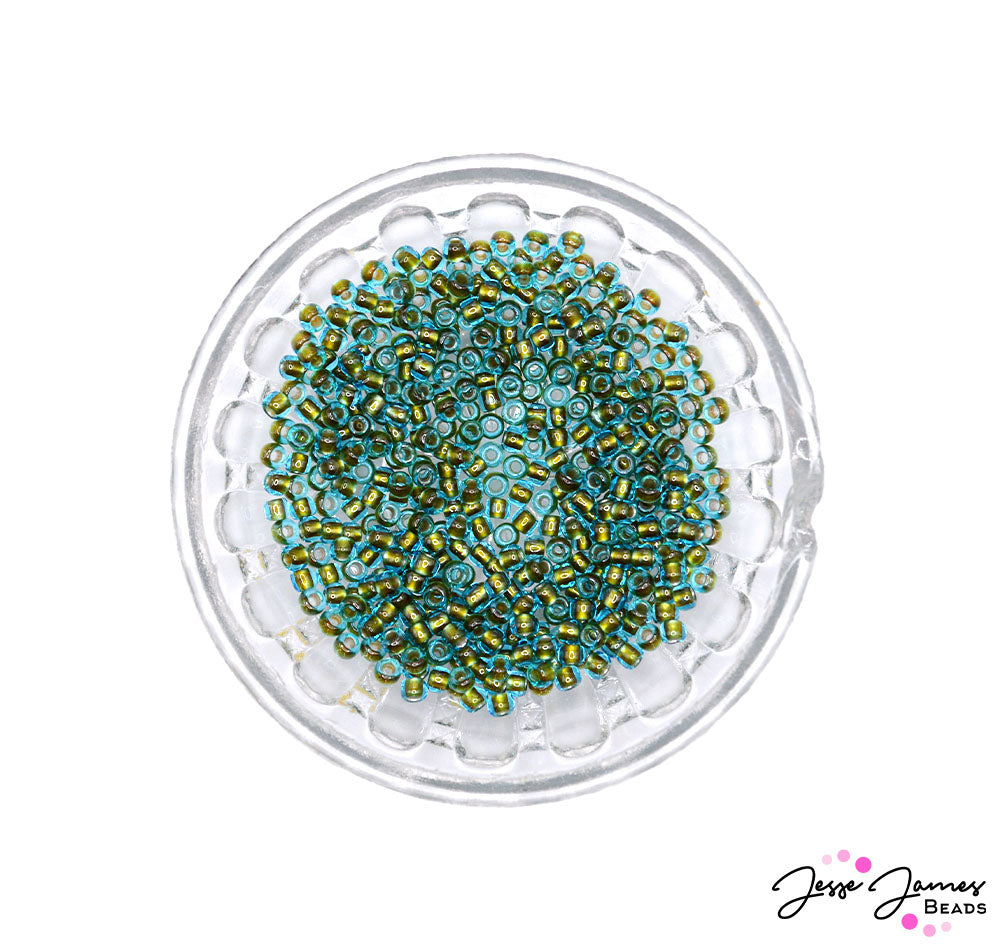 Where elegance meets versatility. These exquisite seed beads are meticulously crafted to perfection, ensuring seamless integration into your designs. The subtle silver lining effortlessly catches the light, lending a radiant allure to your earring, bracelet, and necklace designs. 10 Grams. Size 8/0. Color #1014