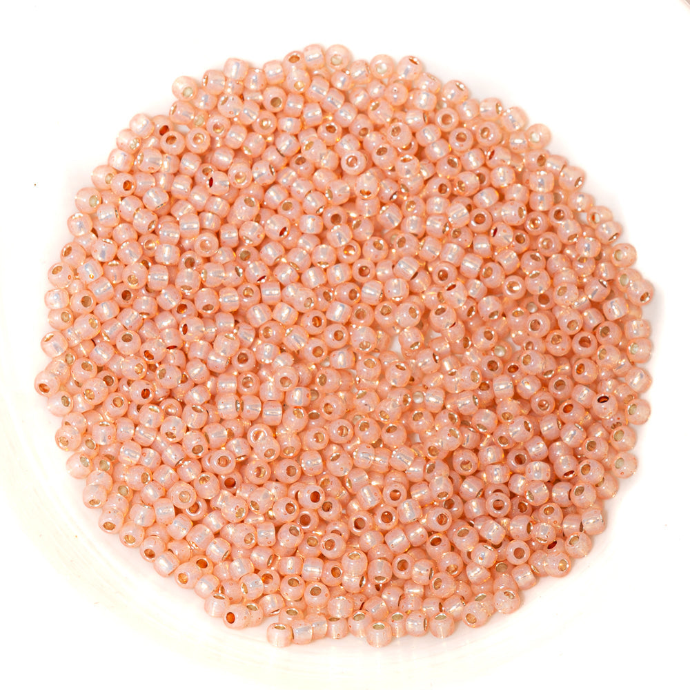 TOHO Glass 11/0 Seed Beads in Silver Lined Strawberry Milk