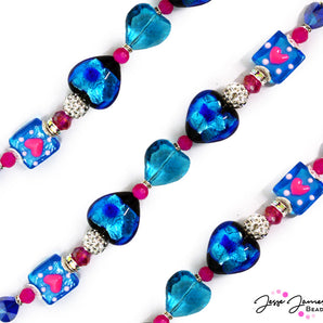 Don't let love leave you blue! This cool blue 6.5 inch bead strand features lampwork hearts and square heart beads paired with rhinestone mini boho beads, mini faceted glass, and rhinestone spacers. Largest bead on strand measures 19.6mm x 20mm x 13.5mm. Smallest bead on strand measures 2mm x 4mm.