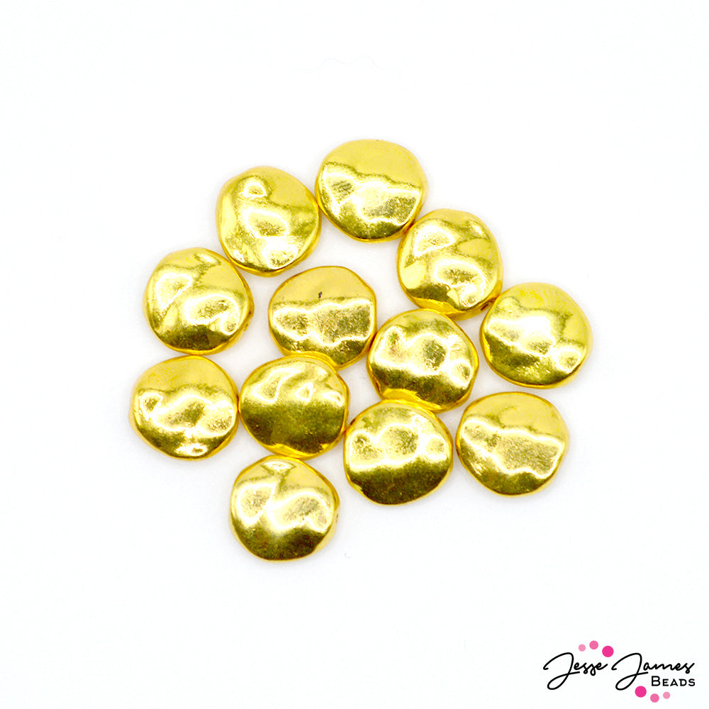 It's your lucky day! This set of gold coin shaped beads feature an organic potato chip shape, ideal for organic jewelry creations. Each coin measures 11mm x 4mm. Each set includes 12 gold coins.