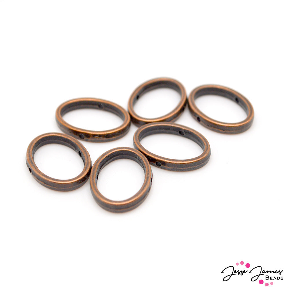 Frame your favorite focal beads with these simple yet elegant bead frames. Each frame features a simple oval shape in a classic bronze color. Each frame measures 14mm x 19mm. 6 pieces per set. These frames make beautiful additions to bracelets, necklaces, or earring designs.