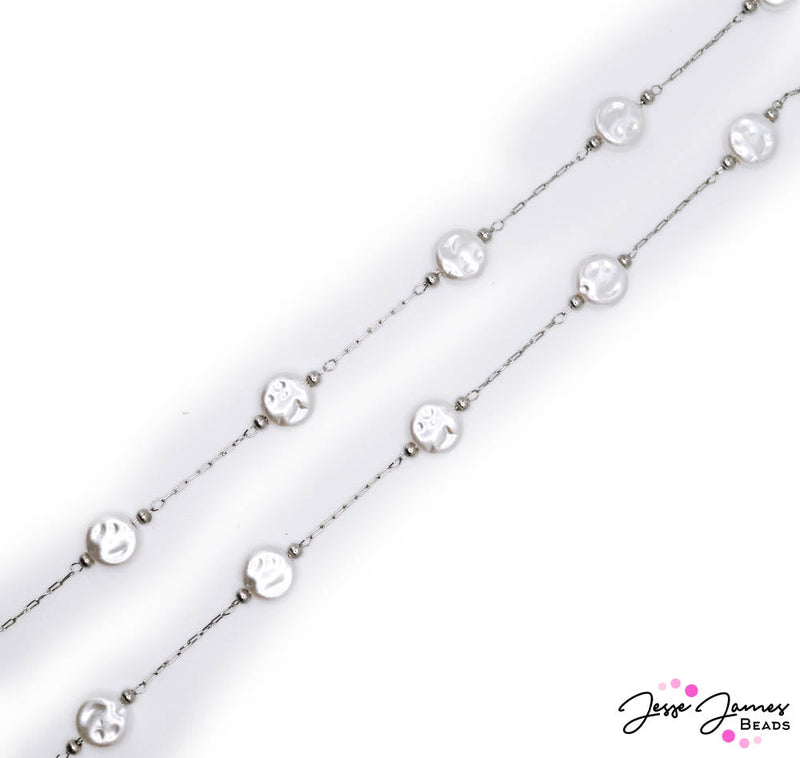 This beautiful brass chain features a bright silver color accented with white glass coin beads. Chain is cut in 24-inch increments. Glass mock pearls measure 8mm x 3mm.