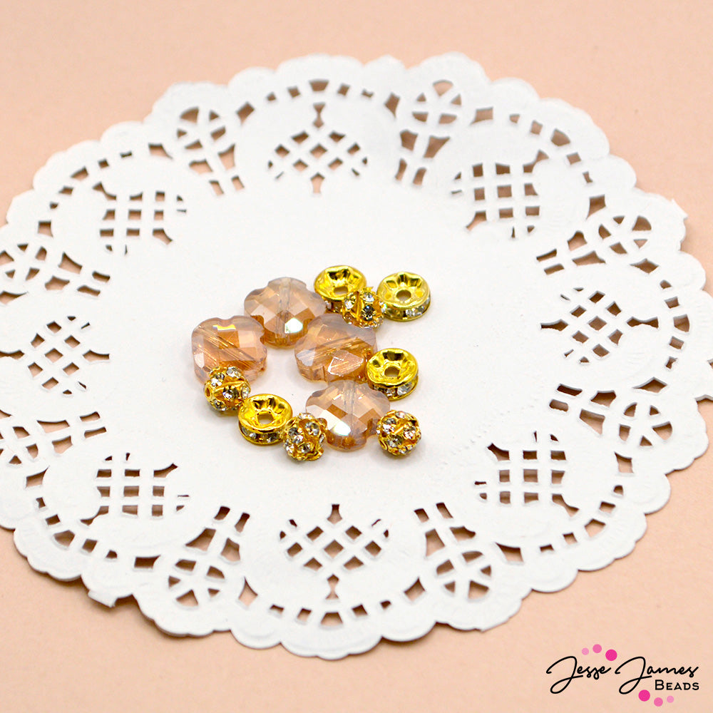 Add a lil' sparkle to your next beading project. This bead set is perfect for earrings, bracelets, and more. Largest beads in set measures 12mm. Smallest bead measures 6mm. 