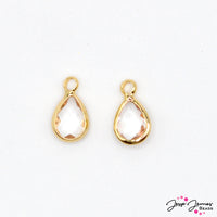 A delightful duo of tiny teardrop-shaped charms that radiate the warm and golden essence of honey. Charms measure 12mm X 6mm X 3mm. Each set contains 2 charms. 