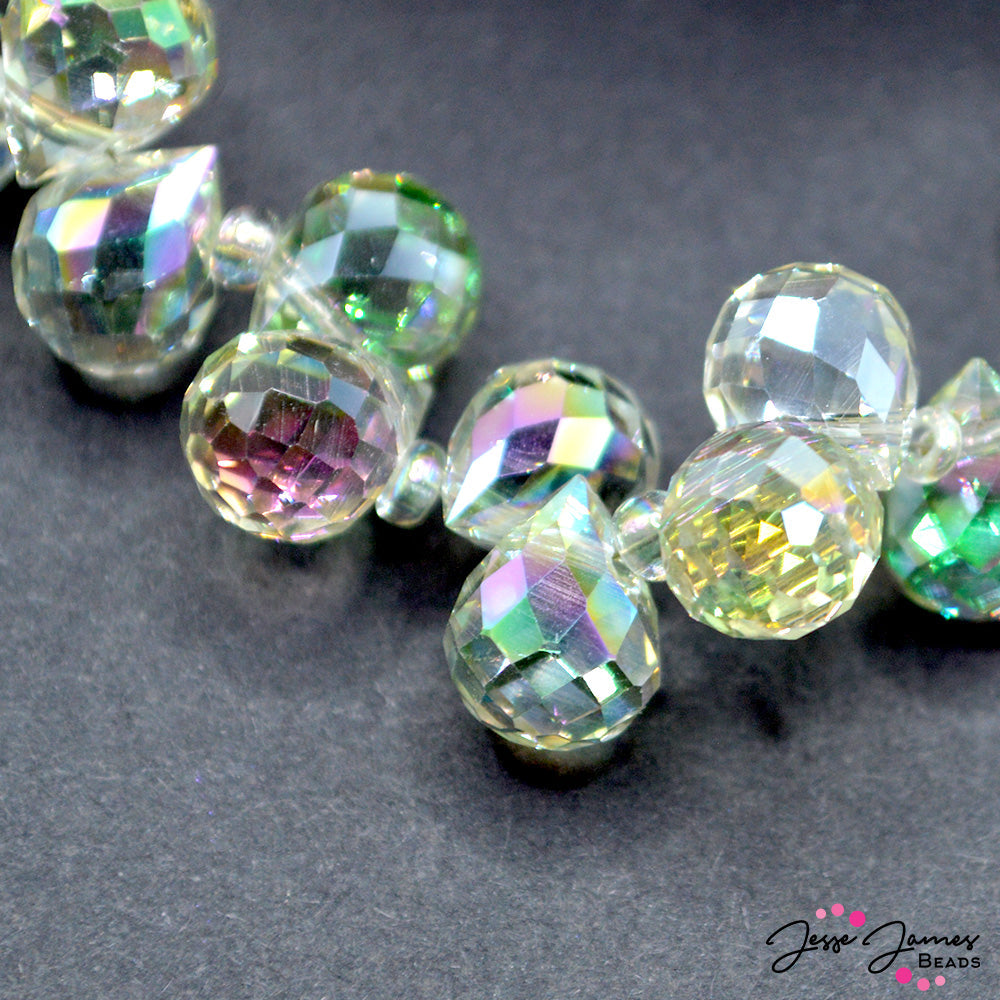 These glass beads are perfect for adding a touch of elegance to your jewelry creations. The AB finish of these beads creates a captivating play of colors, infusing your designs with a sense of depth and enchantment. Measure 11mm X 8mm. Approximately 100 beads per strand. 