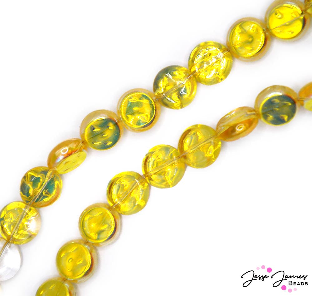 Are you ready to find treasure? These circular shaped beads feature a gold foil texture and color, giving them an ombre of orange and gold hues. These beads are semi-opaque, ideal for earrings, bracelets, and more. 60 pieces per strand. Each beads measures 12mm round.