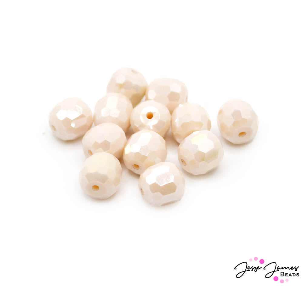 These salty saltwater-inspired beauties feature a complex faceted cut ideal for creating eye-catching jewelry. Each set includes 12 beads. Each bead measures 10mm.