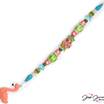 Ready to make a splash? This playful 7 inch bead strand features all the whimsical fun of Summer. Perfect for creating bracelets that echo the rhythm of splashing waves, or anklets that embody the carefree spirit of lazy afternoons by the pool. Largest bead on strand measures 15mm x 12mm. Smallest bead measures 6mm.
