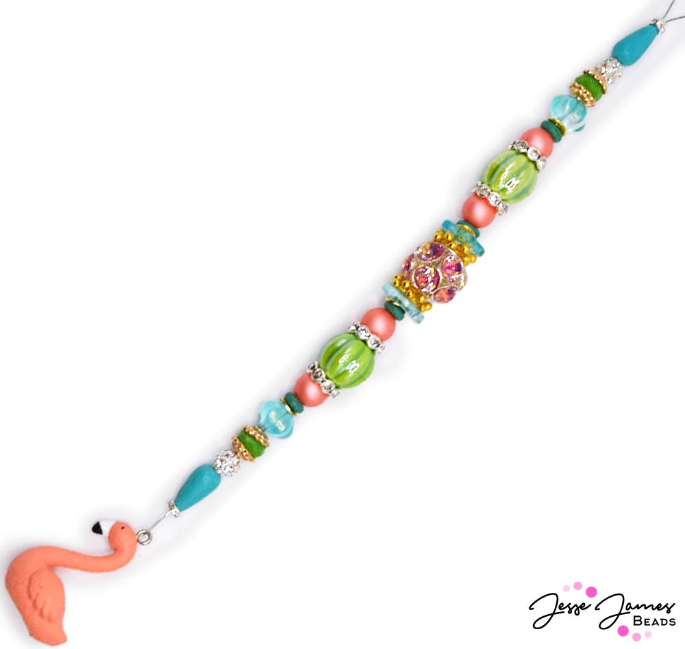 Ready to make a splash? This playful 7 inch bead strand features all the whimsical fun of Summer. Perfect for creating bracelets that echo the rhythm of splashing waves, or anklets that embody the carefree spirit of lazy afternoons by the pool. Largest bead on strand measures 15mm x 12mm. Smallest bead measures 6mm.