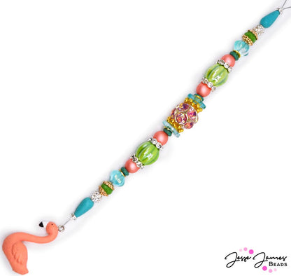 Ready to make a splash? This playful 7 inch bead strand features all the whimsical fun of Summer. Perfect for creating bracelets that echo the rhythm of splashing waves, or anklets that embody the carefree spirit of lazy afternoons by the pool. Largest bead on strand measures 15mm x 12mm. Smallest bead measures 6mm.