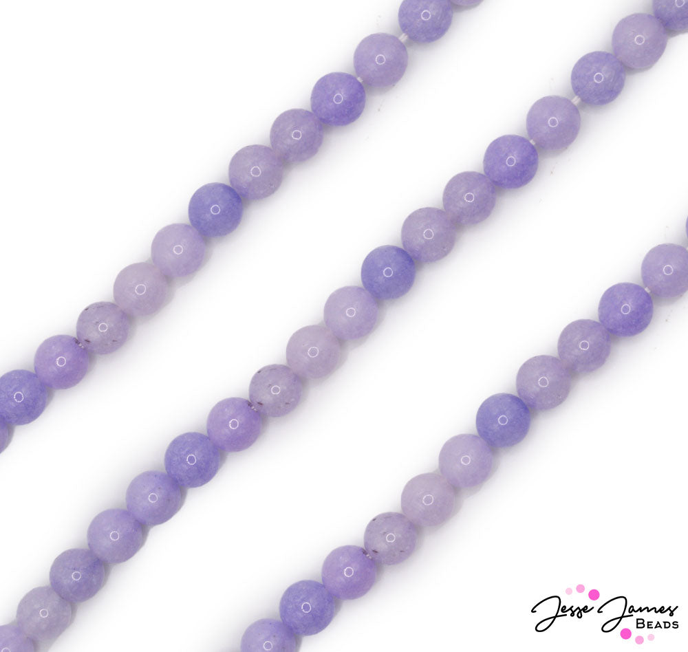 Enjoy the duchess's personal garden of wildflowers. This light purple bead strand features an elegant floral purple hue. These 10mm beads will dazzle garden party guests with their unique faceted sparkle. Approx 30 beads per strand. Beads measure 10mm. 