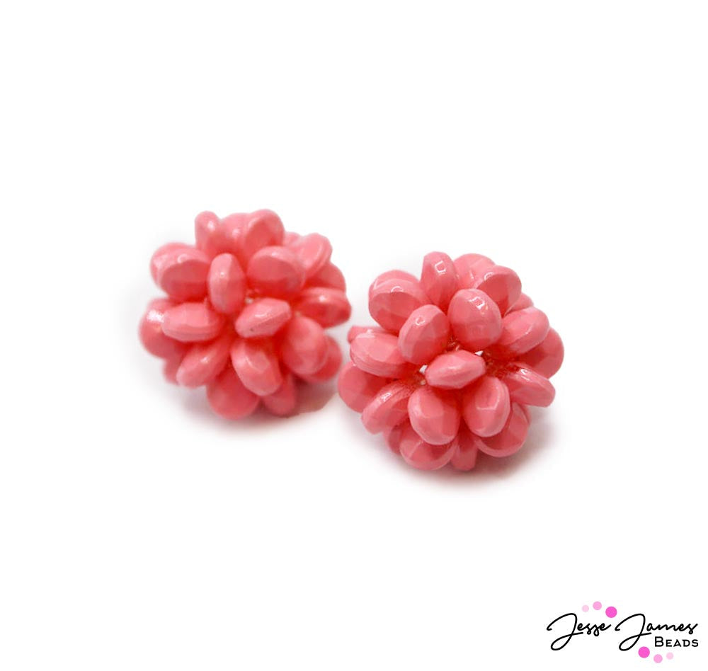 Get your poolside glamour on with these vibrant pink bead. These unique textured beads bring a touch of vintage charm and playful sophistication to your jewelry designs. Beads measure 18mm. 2 beads per set. 