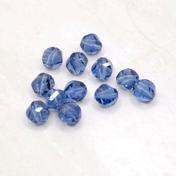 Beads By The Dozen Twisted Glass Rondelles in Royal Blue