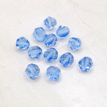 Beads By The Dozen Twisted Glass Rondelles in Cyan