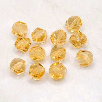 Beads By The Dozen Twisted Glass Rondelles in Golden
