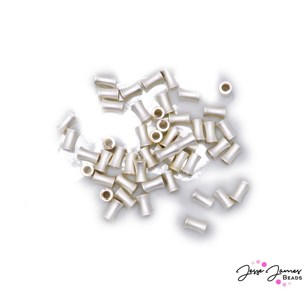 Add classy brushed metal accents to your next jewelry creation. Inspired by mid-century modern design, these beads are easily mixed and matched to create dazzling bracelets, necklaces, and more. Each bead measures 3x5mm. 50 pieces per set.
