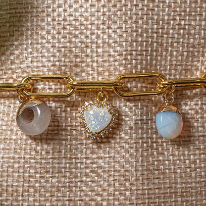 Charm Set in Drops of Stone