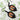 A pair of gothic-style dangle earrings with ornate black metal frames and horse-themed cabochon charms, displayed on a white web-like fabric background.