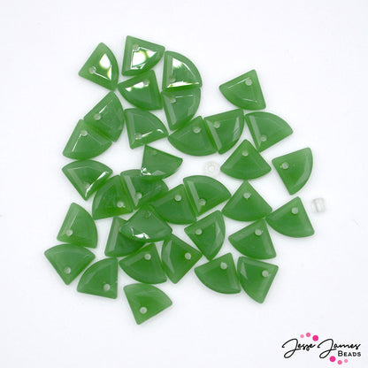 Embrace the beauty of nature with our Gingko Glass Dark Green Bead Set. Let the rich color inspire you to craft jewelry pieces that are both elegant and meaningful. Beads measure 8mm X 9mm. 34 beads per set. 