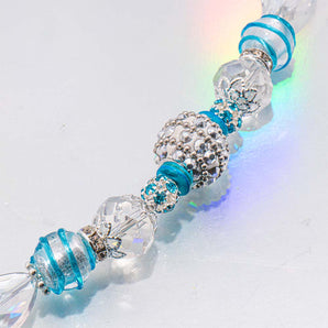 Glass Bead Strand In Breaking Waves