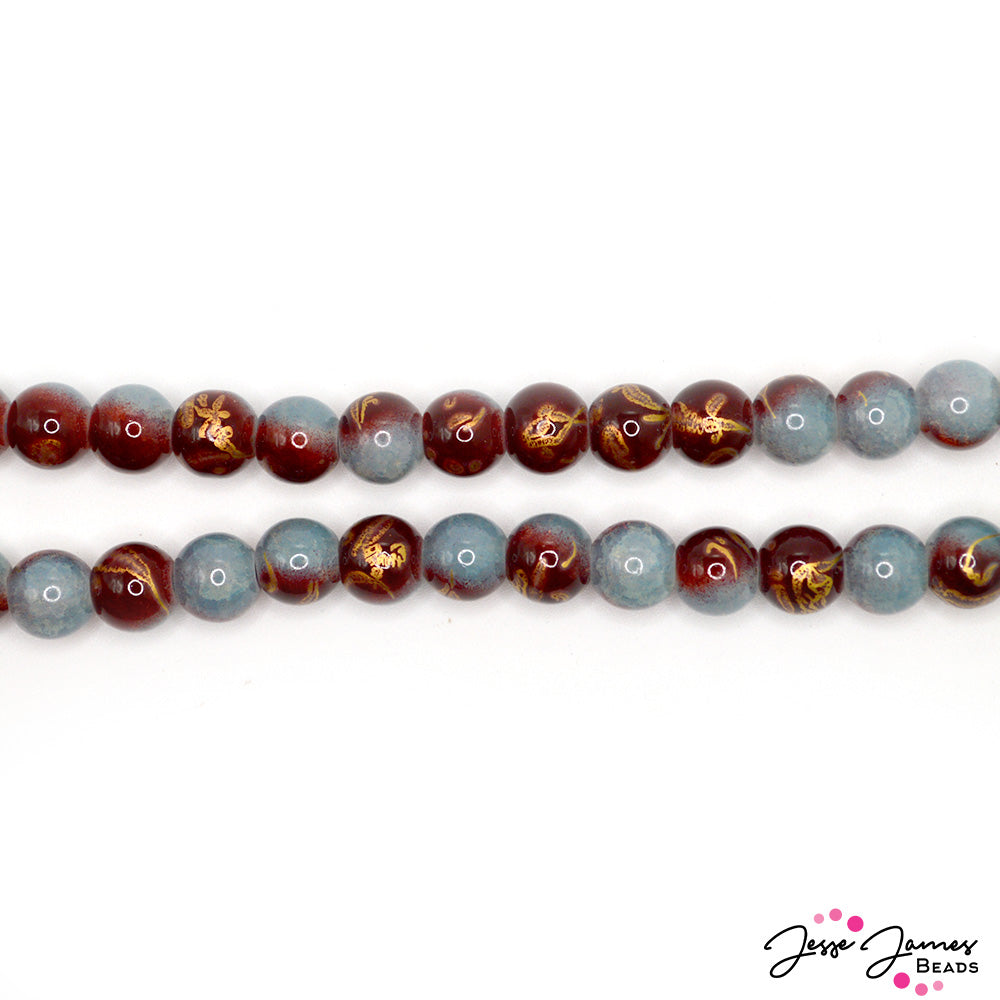 Dive into succulent color with this beautiful two-toned glass beads. These beads feature a unique ombre of light blue and bronze. Each bead measures 10mm round. Sold by the strand. Each strand includes 80 beads.