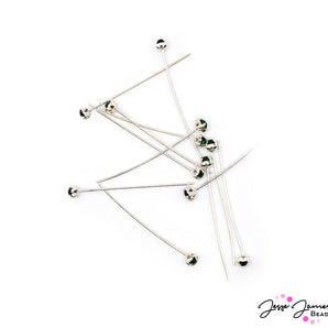Head Pin Set in Emerald Eyes