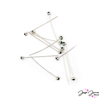 Head Pin Set in Emerald Eyes