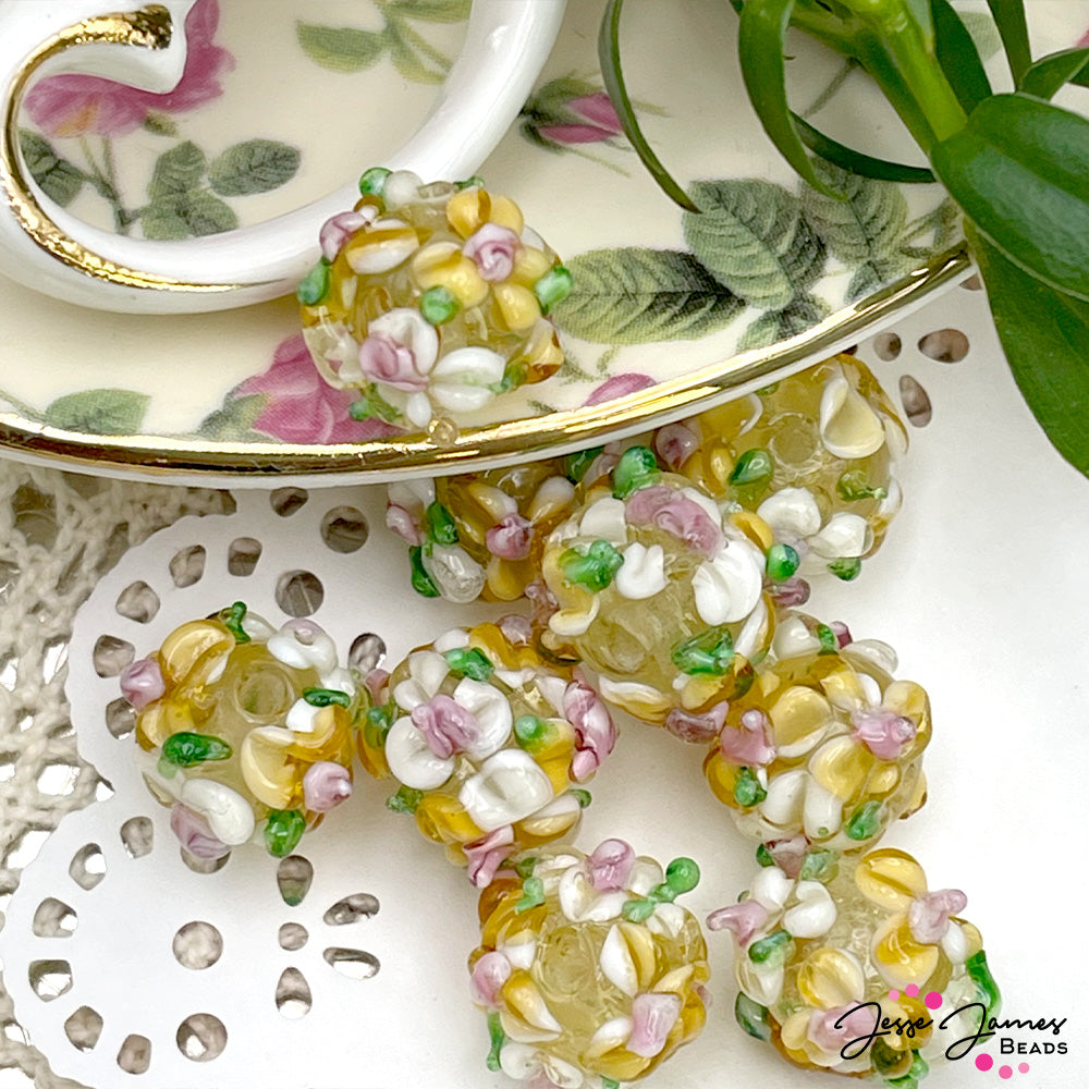 flowers represent true love and good fortune making the an ideal element for breathtaking earrings, bracelets, and more. 1 Bead per set. Measures 11mm.