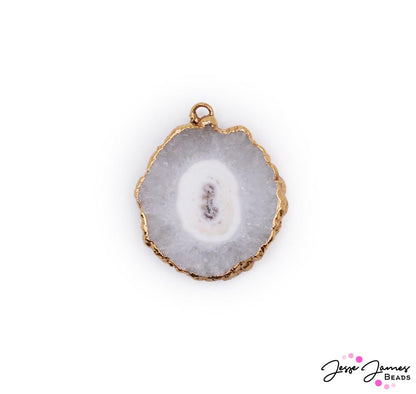 This bold statement pendant features a sliver of Agate stone surrounded by gold plated accents. Due to naturally cut agate stone each pendant has it's own character! Including various shapes and sizes. On average, pendants measure 32mm x 25mm x 6mm. Inner bail measures 2mm.