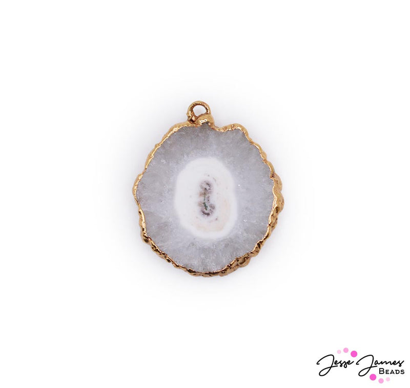 This bold statement pendant features a sliver of Agate stone surrounded by gold plated accents. Due to naturally cut agate stone each pendant has it's own character! Including various shapes and sizes. On average, pendants measure 32mm x 25mm x 6mm. Inner bail measures 2mm.