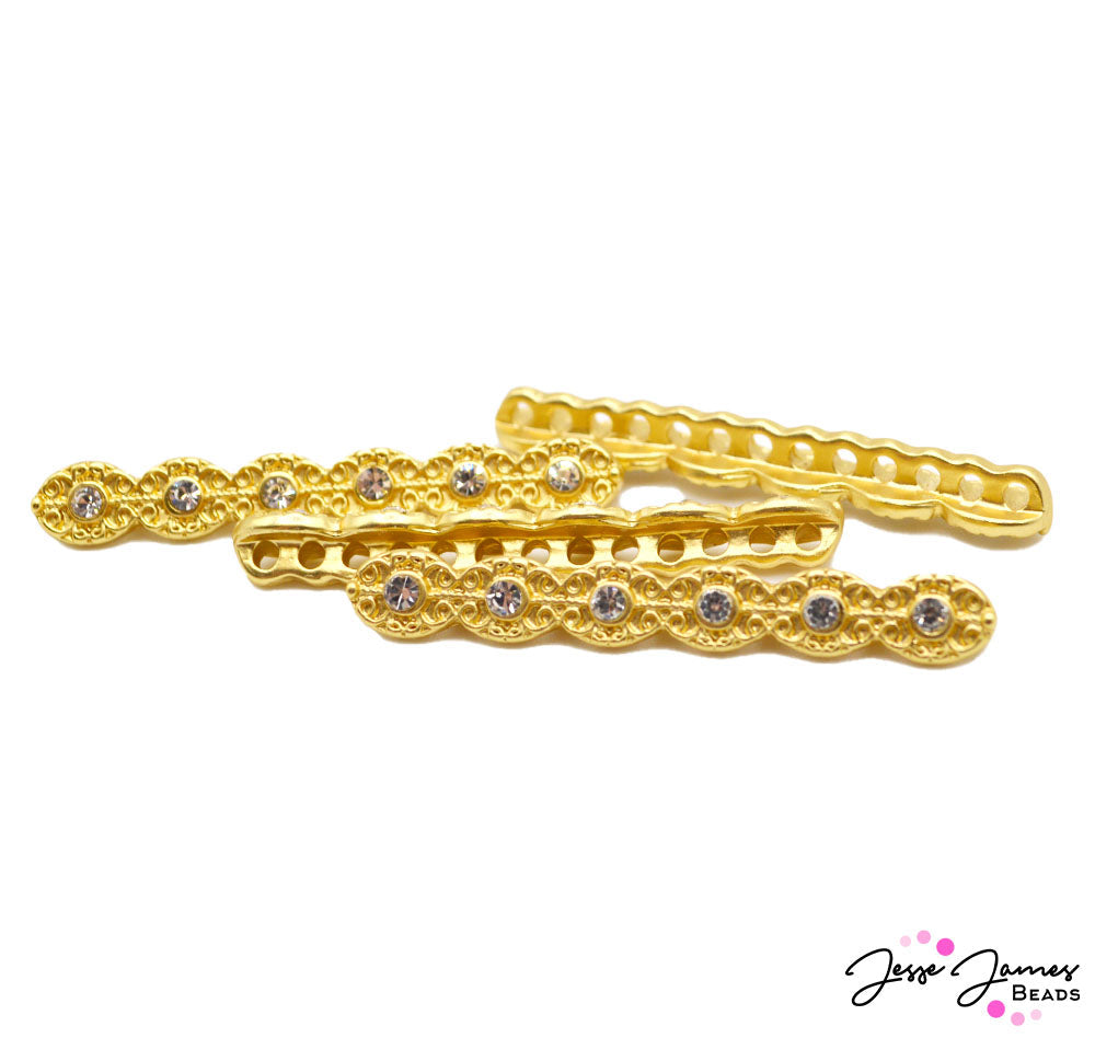Create elegant jewelry you've only ever dreamed of with these delicate multi-strand collectors. Each connector is adorned in bright gold plating dazzled with sparkling rhinestones. Measures 43mm X 6mm. 