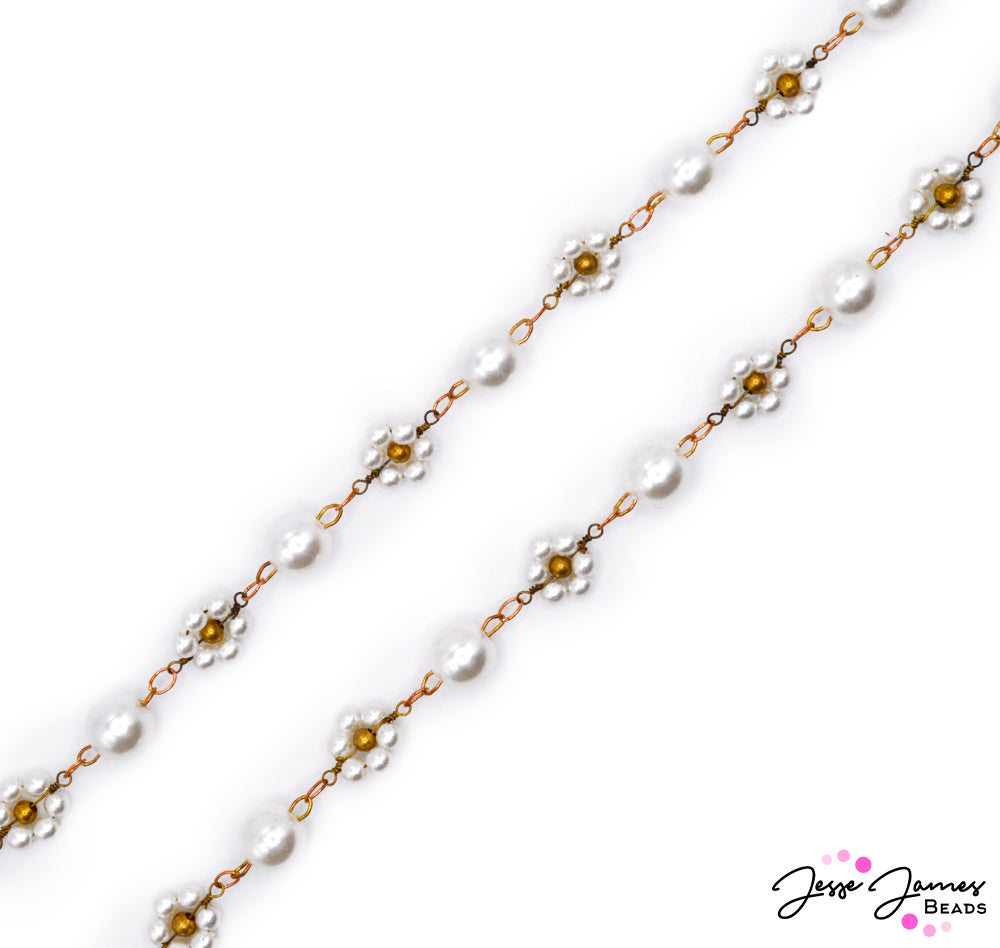 Transform your creations into works of art with the Flower Pearl Beaded Chain, and let your imagination bloom as you craft jewelry that is as enchanting as it is elegant. With its timeless appeal, this chain is sure to become a cherished addition to your jewelry-making collection. Sold in 18" Cuts. Faux Pearls