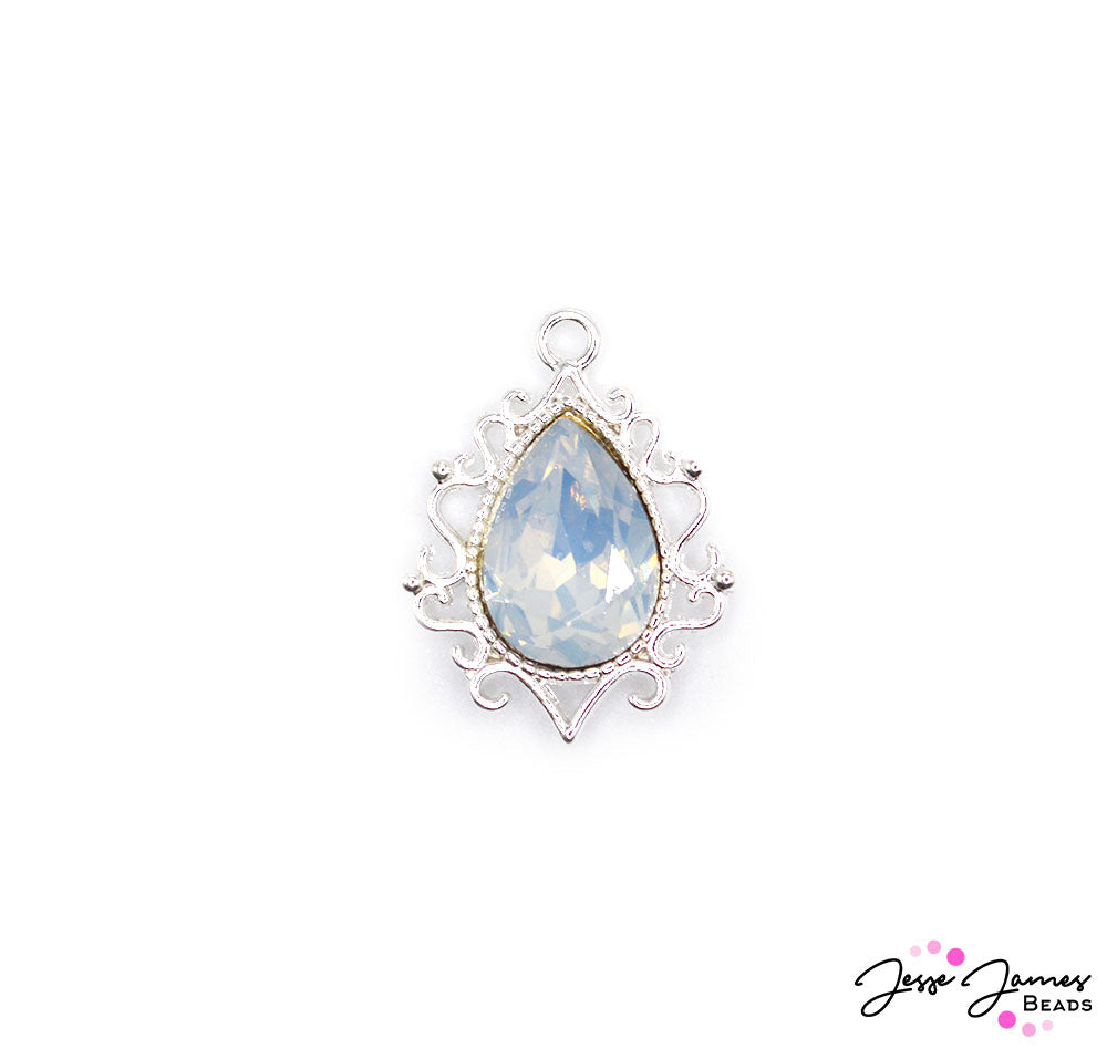 Join an exclusive club of sparkle with this classy focal pendant. These high-quality sparkles are emitted from the beautiful focal opal rhinestone adorned with bright silver-plated metal framing. 1 pendant per set. Measures 25mm X 19mm X 6mm