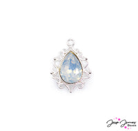 Join an exclusive club of sparkle with this classy focal pendant. These high-quality sparkles are emitted from the beautiful focal opal rhinestone adorned with bright silver-plated metal framing. 1 pendant per set. Measures 25mm X 19mm X 6mm