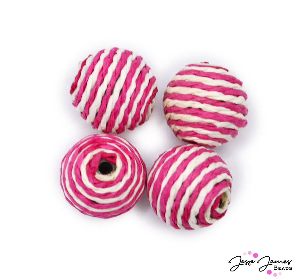Ready to wrap and roll? These woven round beads feature a hypnotising blend of bold pink and white. Each beads measures 20mm. Sold in sets of 4.