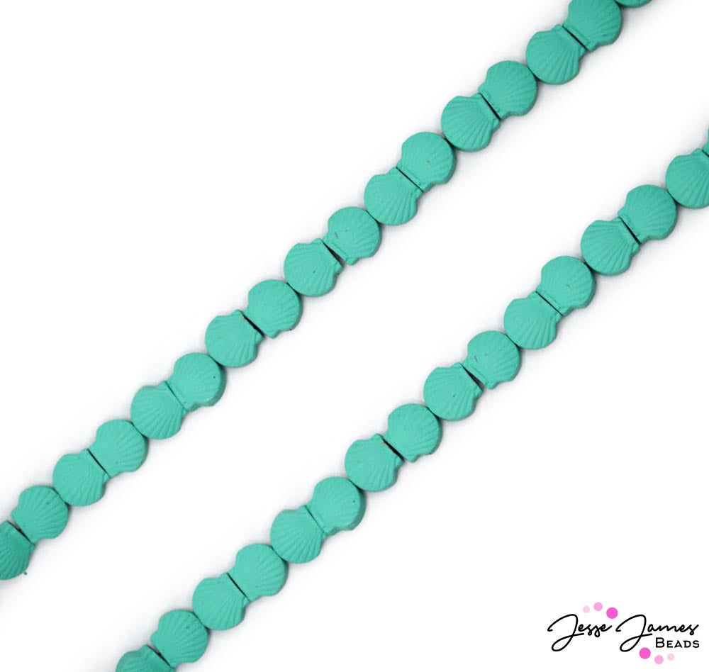 These playful metal beads feature teal colored Hematite, ideal for adding a nautical feel to anklets, bracelets, and more. Each bead features it's own unique personality as color may very from piece to piece. 32 beads per set. Each bead measures 8mm x 9mm x 4mm. Made of Hematite.
