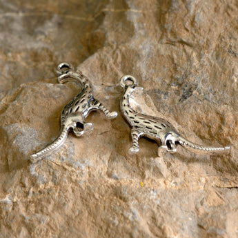 Silver Metal Charm Pair in Dreadnoughtus