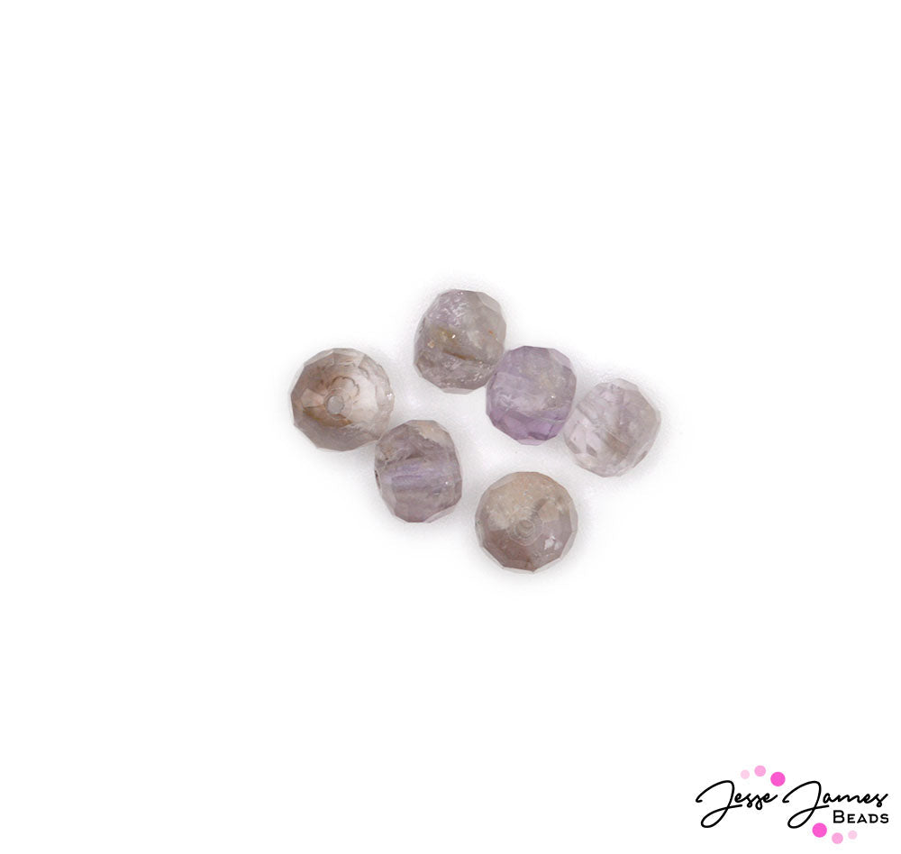These exquisite faceted amethyst beads are the perfect component to bring harmony to your next jewelry creation. Each faceted glass bead features a rich purple hue. Illustrate your wisdom and strong spirit with these dainty stone beads.