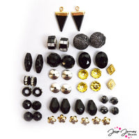 Gatsby Bead Mix from Jesse James Beads features Faceted Glass, Rhinestone Spacers, Faux Stone Pendants, Pom Pom Charms, Custom Metal, Bead Caps, and more.