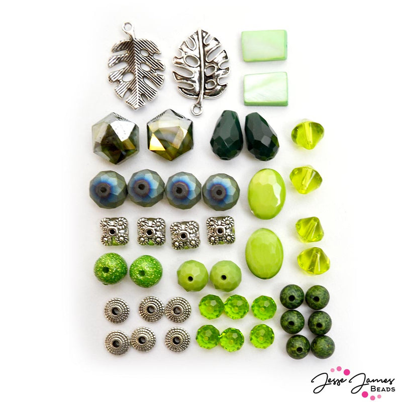 Rainforest Bead Mix from Jesse James Beads featuring metal charms, faceted glass beads, silver metal spacers, acrylic statement beads, and more.