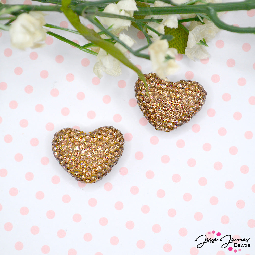 Fall totally in love with these topaz rhinestone heart focals. Add these sparkling focal to earrings, necklaces, or keychain charms. 2 beads per order. Measure 18mm X 22mm. 