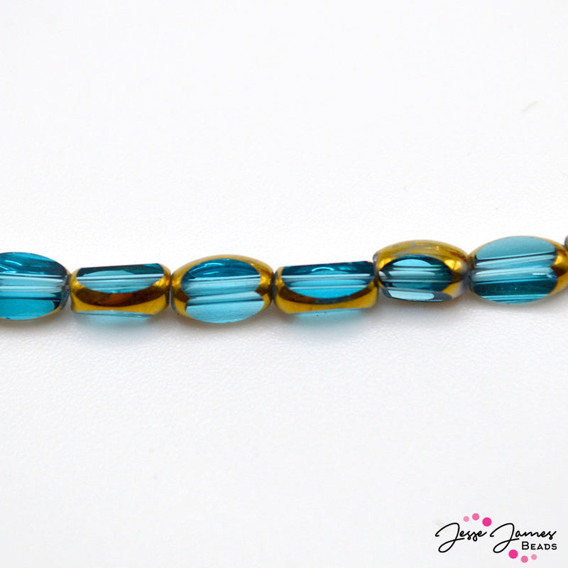 These dreamy aqua blue beads feature a bright gold accent. These mini beads come in a strand of 50, perfect for creating earrings, necklaces, and more. Each bead measures 6mm x 3.5mm. Hole size 1mm.