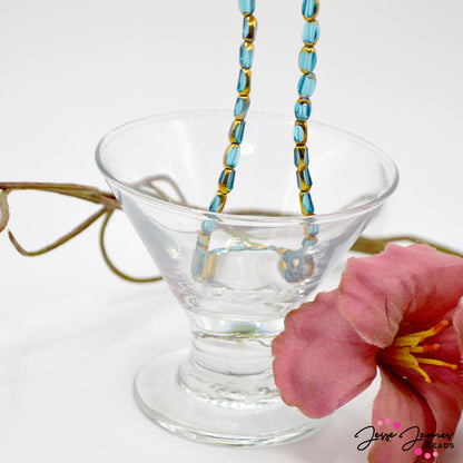 Glass Bead Strand in Blue & Gold Three Sided Lentil