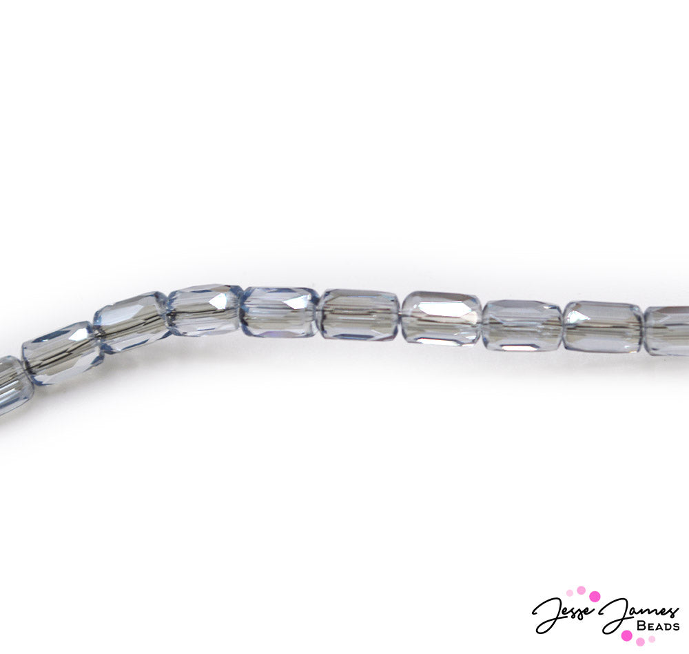 These super sparkly rectangular shaped beads are perfect for creating modern looking earrings, bracelets, and more. Each strand features a beautiful blue grey color in a semi-transparent finish. Each strand includes 80 beads. Each bead measures 6mm x 4mm.