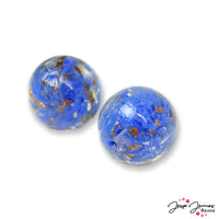 Add a touch of sparkle to your next project with these handmade lampwork beads. These beads features a swirl of rich blue color mixed with hidden pockets of glitter for a surprise sparkle. Beads come in a set of 2. Each bead measures 20mm.