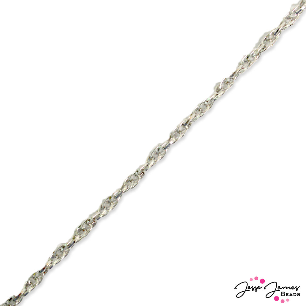 Sweet skinny chain in rhodium is perfect for creating layered necklaces. String your favorite large hole bead over, or add a charm. Sold in 1 meter lengths. Links measure 3.5 x 4.5.